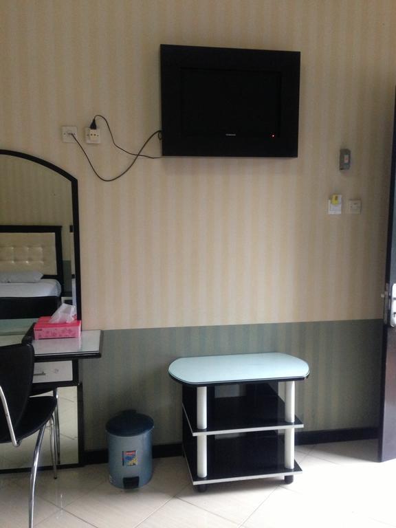 Global Inn Keluarga Sedati Bilik gambar