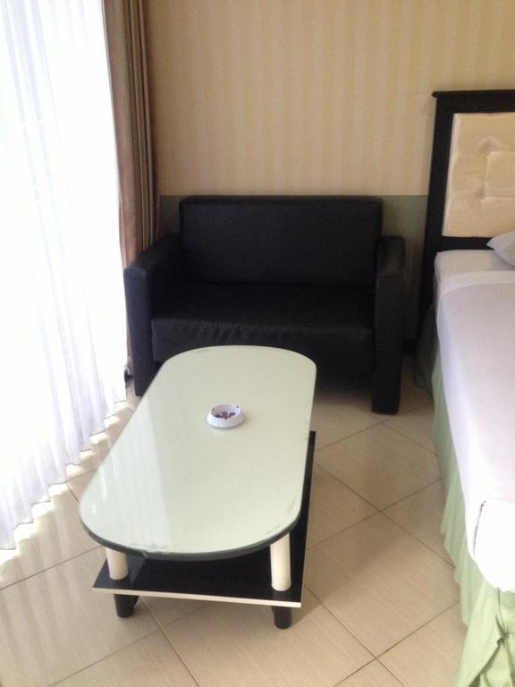 Global Inn Keluarga Sedati Bilik gambar