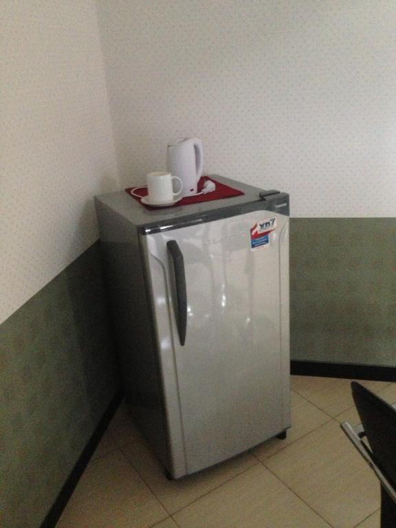 Global Inn Keluarga Sedati Bilik gambar