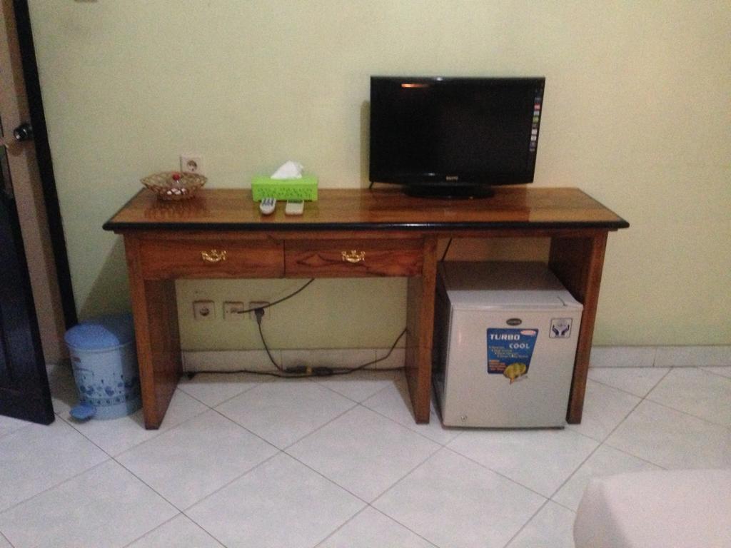 Global Inn Keluarga Sedati Bilik gambar